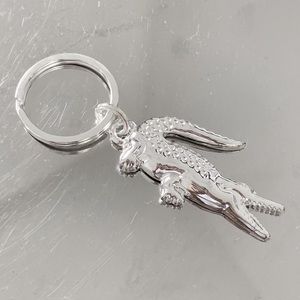 lacoste silver crocodile